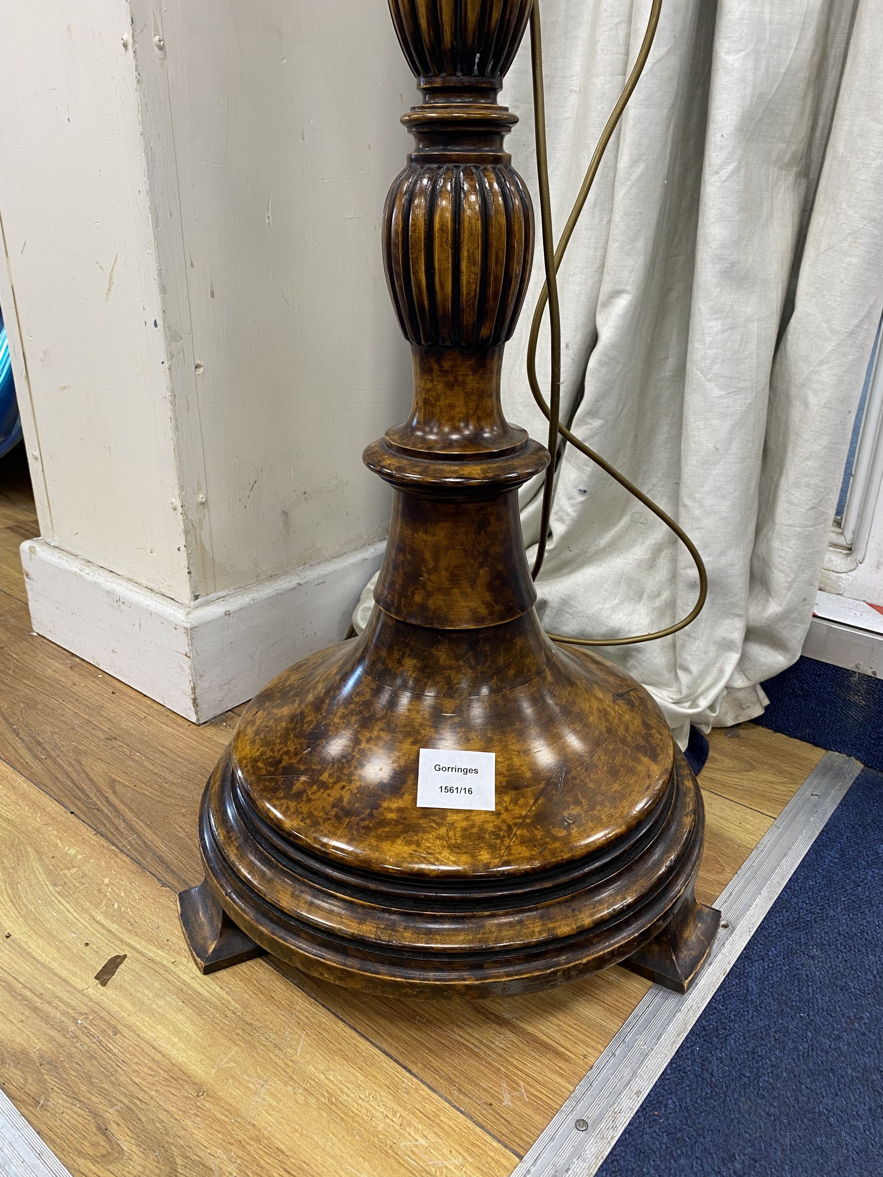 An early 20th century spiral turned walnut standard lamp, height 150cm